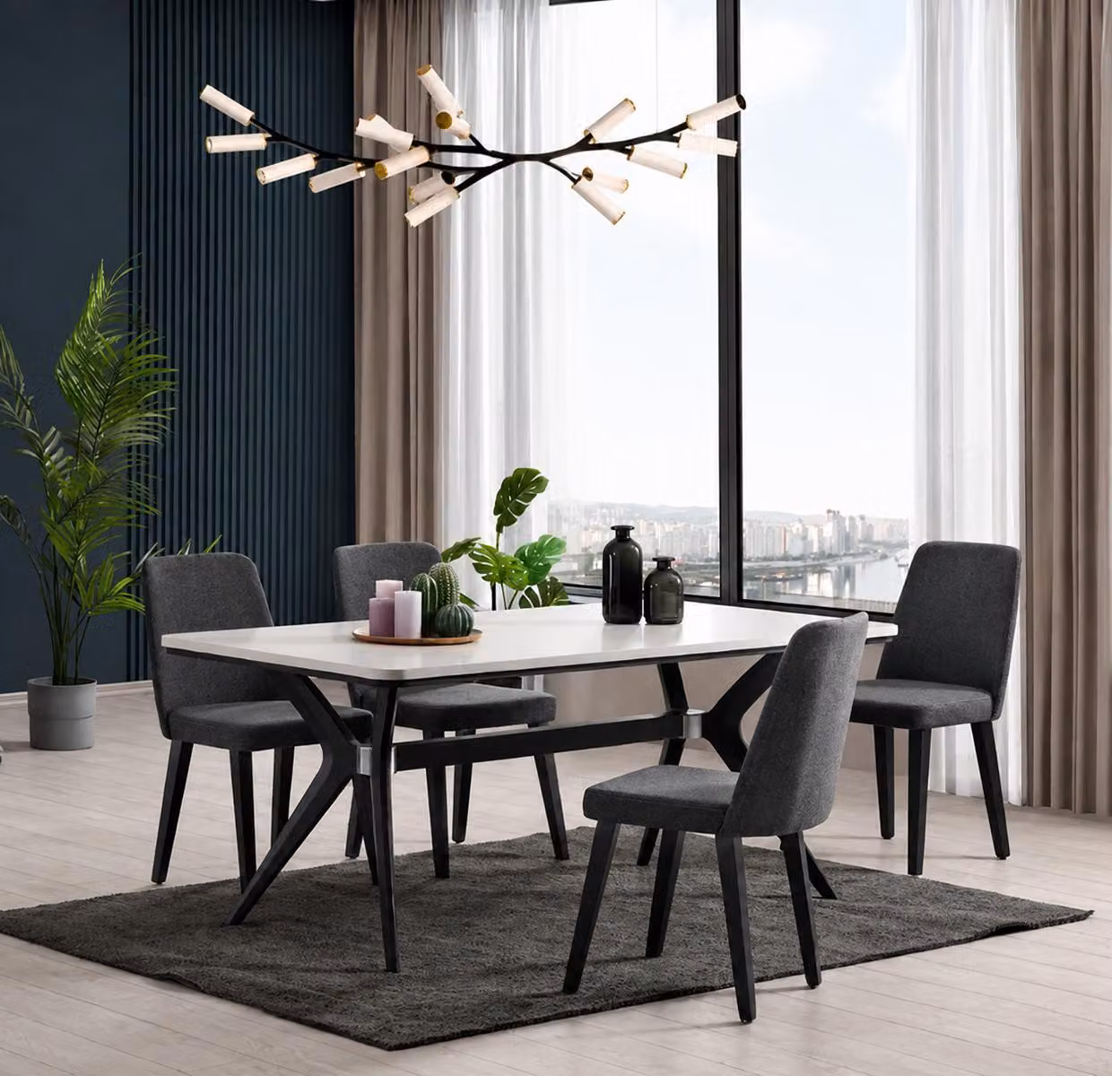Set da pranzo composto da tavolo e 4 sedie, in color grigio scuro, ideale per un'atmosfera moderna