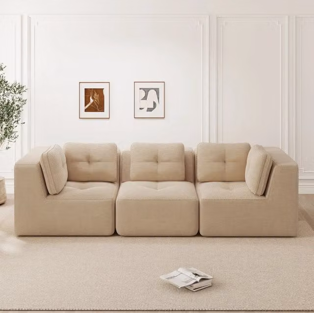 Divano angolare modulare senza struttura; in tessuto corduroy beige; seduta profonda 74 cm
