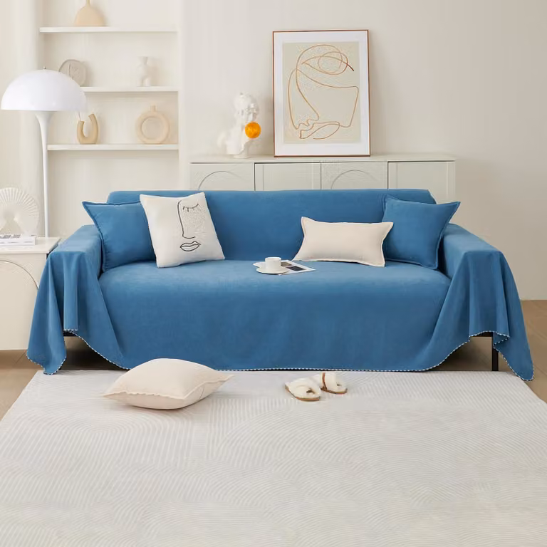 Copertura morbida e universale per divano, con design reversibile