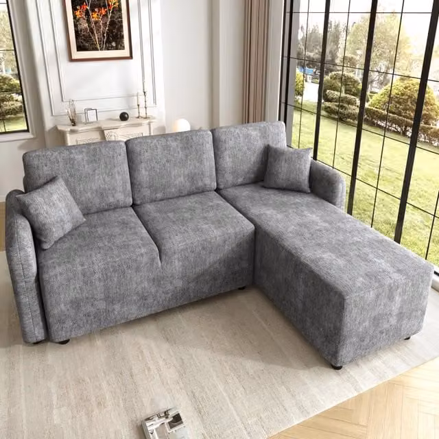 Divano angolare a L Mivray con chaise longue, rivestito in tessuto grigio, con struttura in legno e cuscini inclusi per il tuo soggiorno moderno