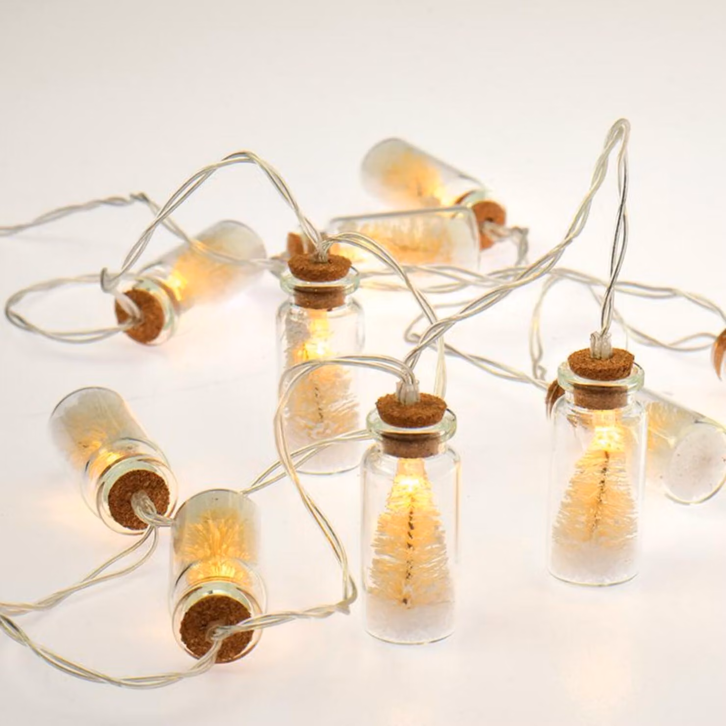 ACA Lighting "MINI glass bottle" alberi bianchi, 10 LED decorativi a batteria (2xAA) bianco caldo IP20 135+30cm cavo trasparente XJ10WW2A