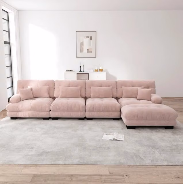 Divano modulare angolare in ciniglia rosa con pouf mobili e cuscini