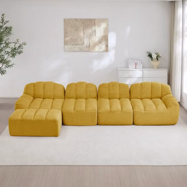 Divano angolare modulare OKWISH a 4 posti con pouf, seduta ampia in pile granulato giallo per soggiorno