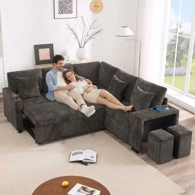 Divano letto angolare estraibile Minimal grigio in tessuto con contenitore, porte USB e cuscini inclusi – 1