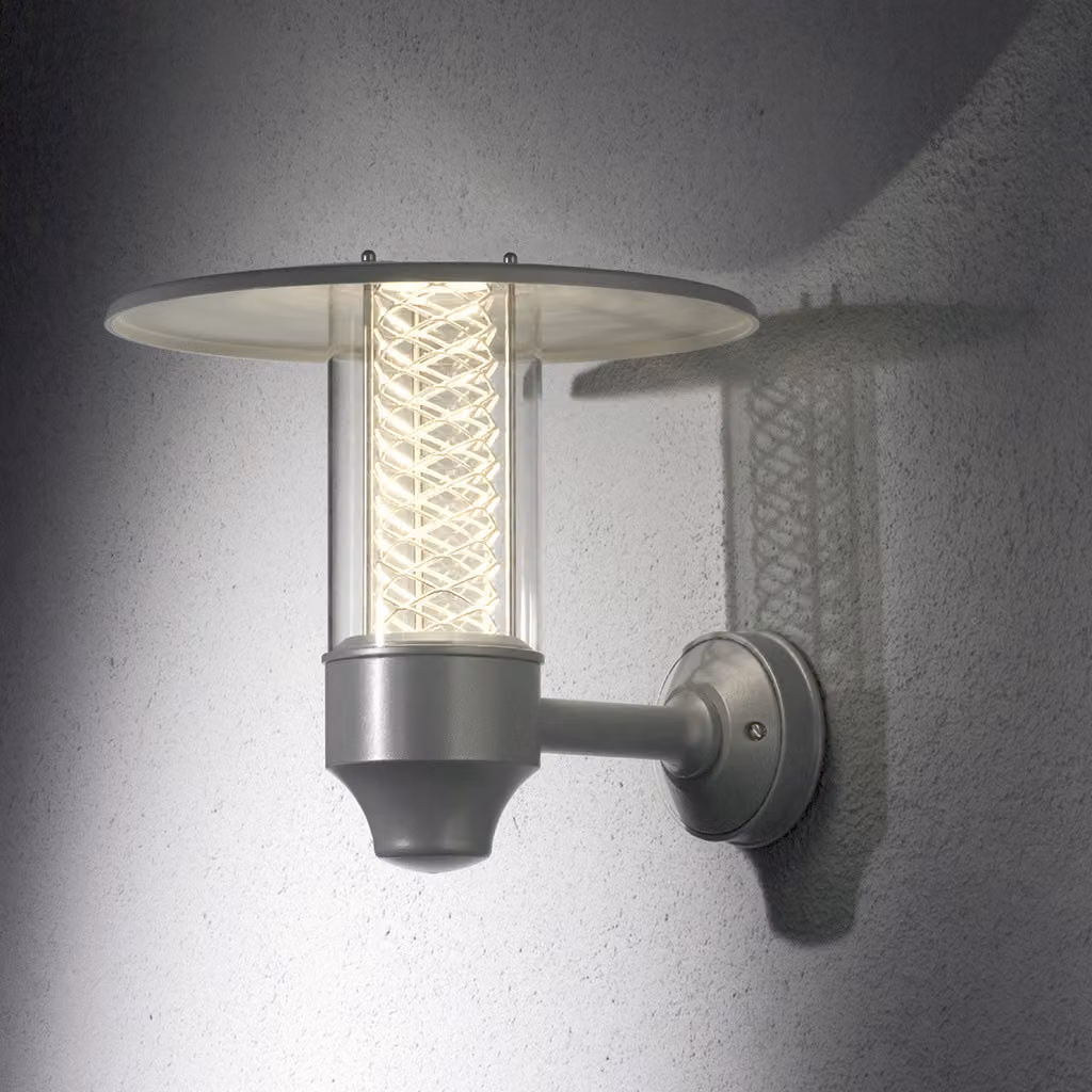 Applique Konstsmide Nova in alluminio laccato argento con vetro acrilico trasparente