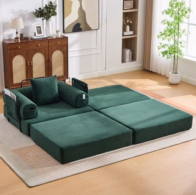 Poltrona modulare ULEVR 112x190x67 cm con pouf, cuscino e tasca laterale, velluto a coste verde smeraldo
