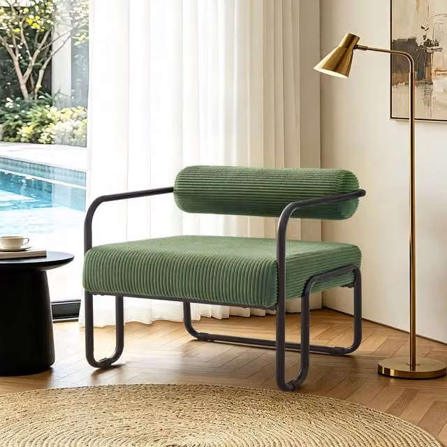 Poltrona lounge Mivray in cord verde con struttura in metallo nero opaco e schienale cilindrico