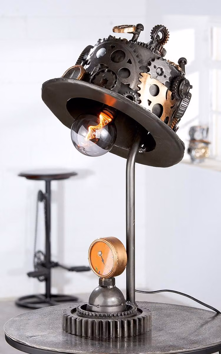 Lampada da tavolo Gilde, stile steampunk, motivo cappello, metallo, color argento, confezione da 1.
Altezza: 63,00 cm
Larghezza: 33,00 cm
Profondità: 27,00 cm
Codice prodotto: 68068