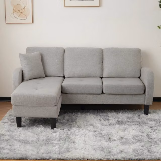 Divano angolare modulare REDOM grigio in tessuto, reversibile e moderno, L/P/H: 166 x 118 x 77 cm – 1