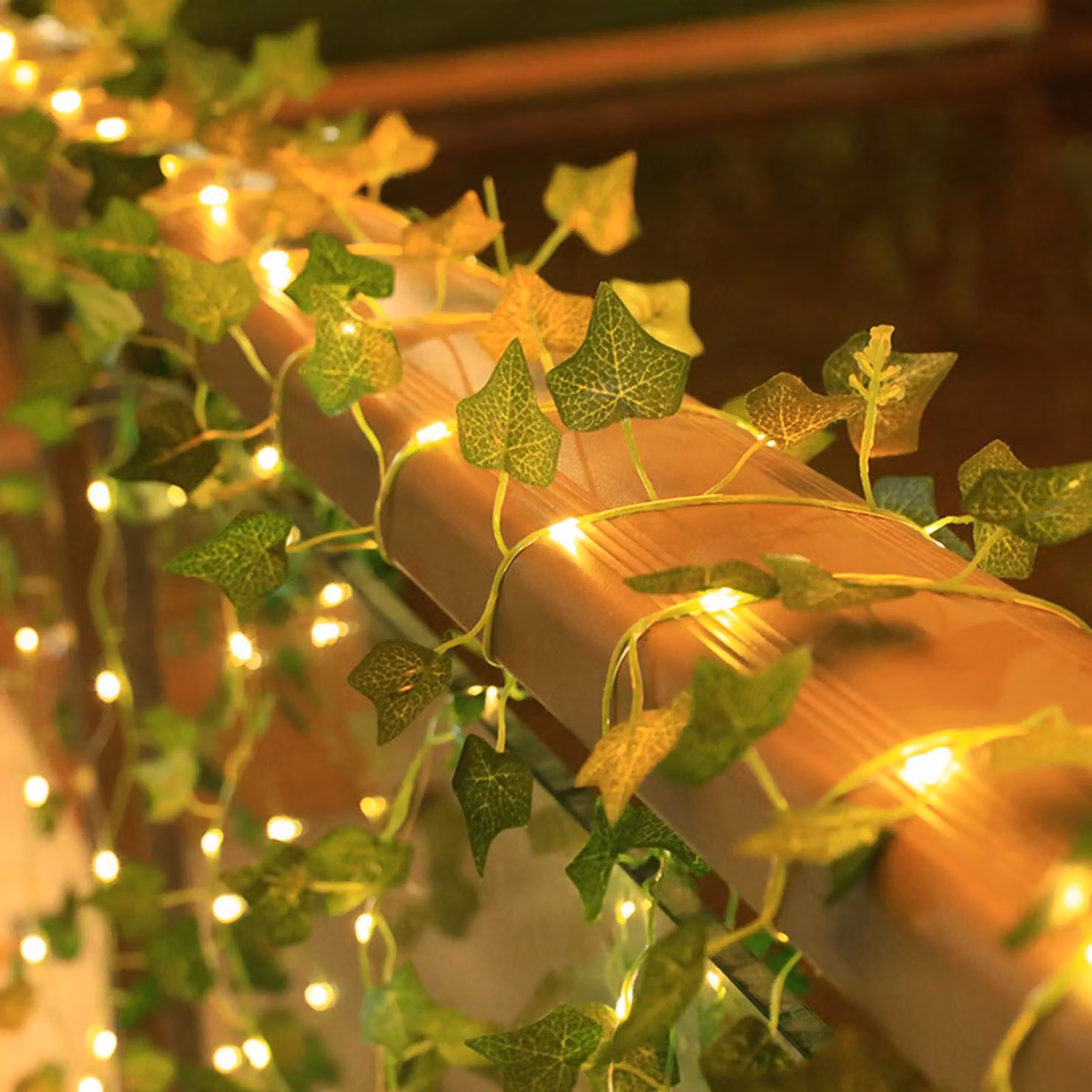 Catena luminosa da 2 metri, 20 LED, forma a foglia, effetto "fiamma" magico, luce bianco caldo