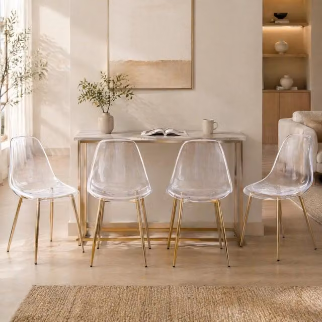 Set di 4 sedie da pranzo ULEVR in ABS trasparente con gambe in metallo dorato, 53x47x51 cm