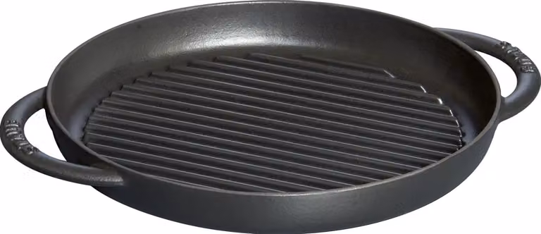Griglia tonda in ghisa per induzione colore nero con maniglie di Staub, diam.22cm