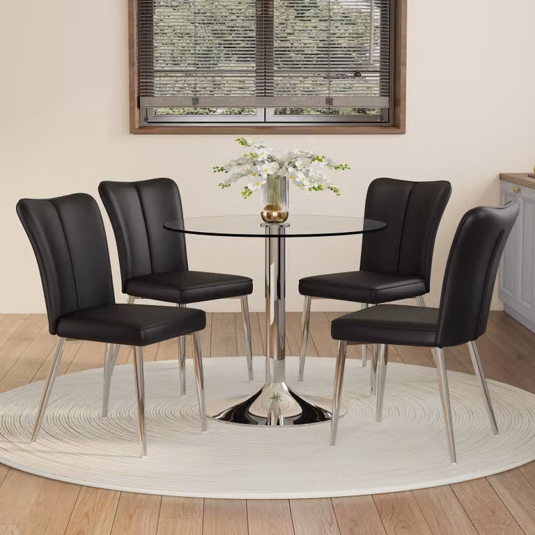 Set da pranzo, tavolo in vetro diametro 85 cm, 4 sedie in poliuretano, gambe argentate (colore nero e argento)