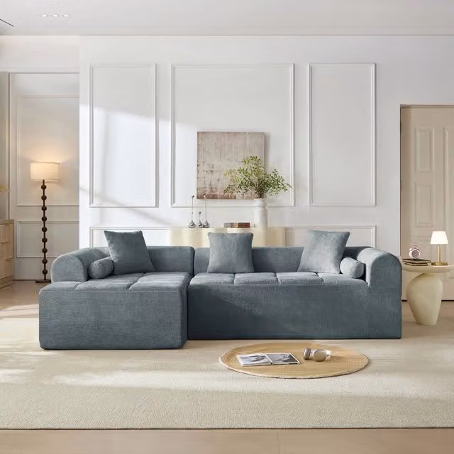 Divano in ciniglia blu con tasca laterale; 263 × 132;5 × 68 cm
