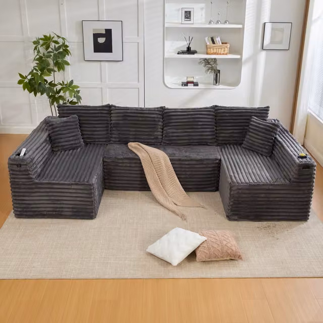 Divano modulare a U OKWISH in velluto a coste grigio scuro con portabicchieri, tasca laterale e cuscini inclusi L: 320 cm, P: 155 cm, H: 88 cm