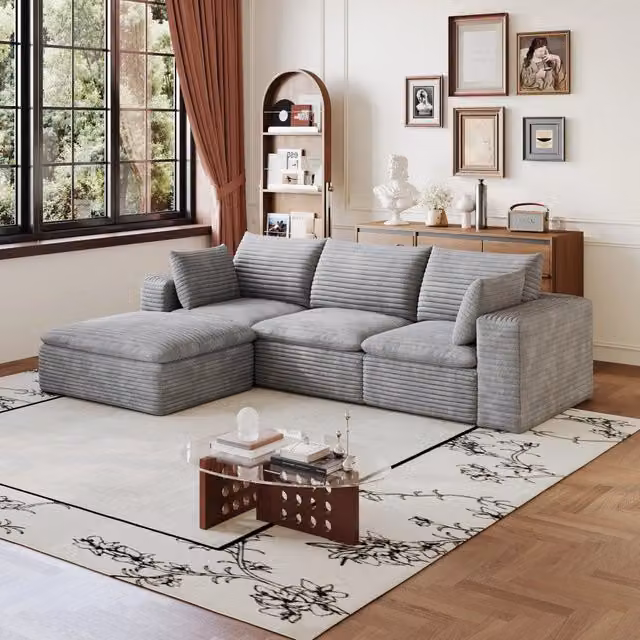 Divano modulare in tessuto grigio con imbottitura in schiuma e design componibile