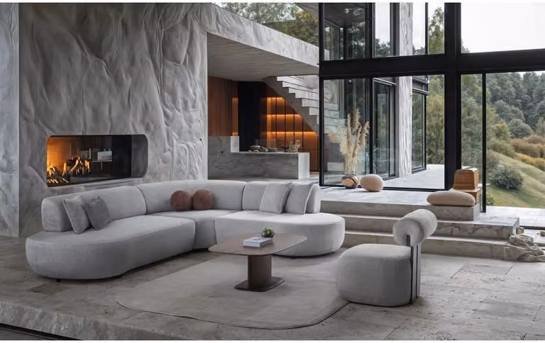 Set moderno per soggiorno, composto da un divano angolare a forma di "L" beige e una poltrona, in due pezzi