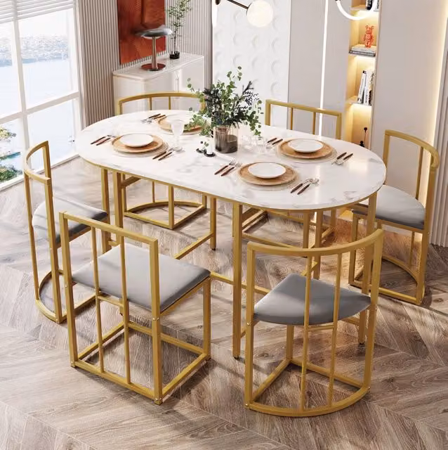 Set da pranzo con tavolo in MDF e 6 sedie con schienale; imbottitura in velluto grigio e struttura oro