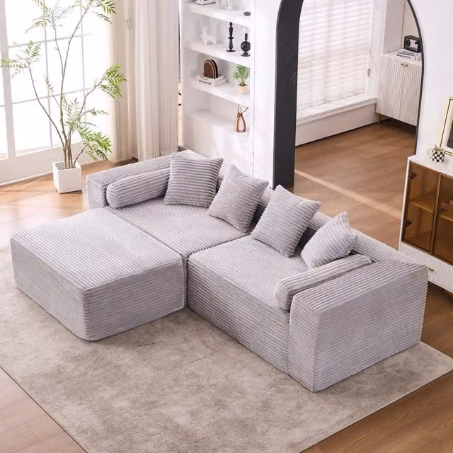 Divano componibile 217.0x110.0x60.01 cm con chaise longue; schiuma e molle grigio