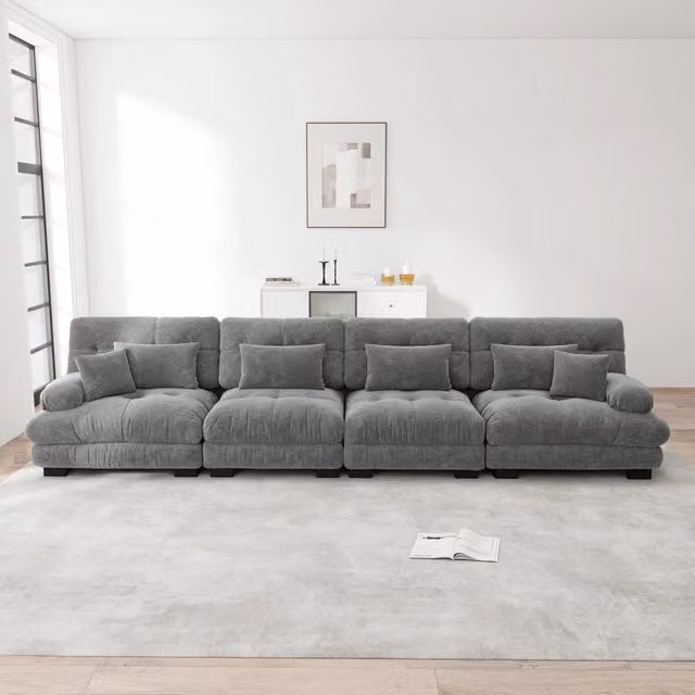 Divano angolare modulare MIVRAY in tessuto grigio con design moderno e cuscini inclusi per il tuo soggiorno