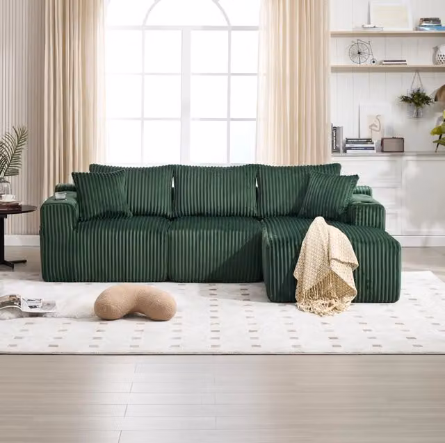 Divano modulare 257x160x62 cm in tessuto verde con tasche laterali, per piccoli spazi –