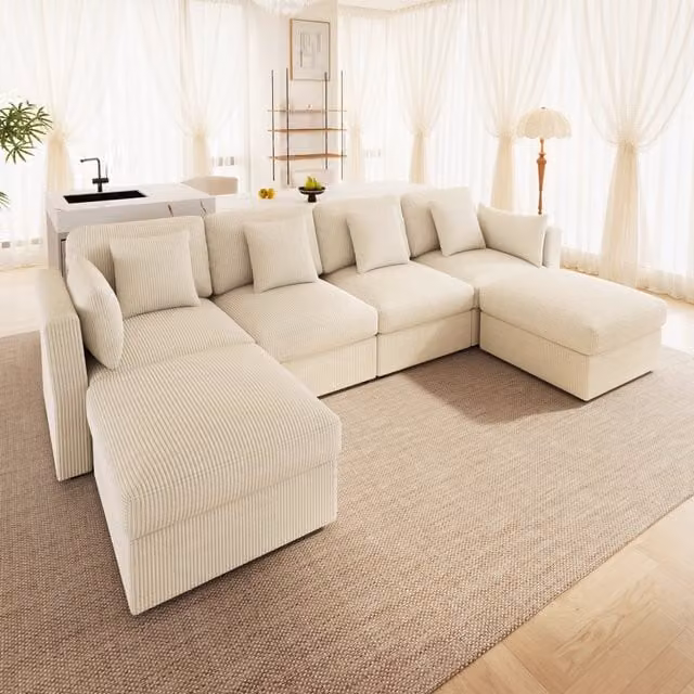 Divano angolare modulare con braccioli regolabili e 2 pouf mobili in tessuto a coste beige 290 × 159,5 × 89 cm