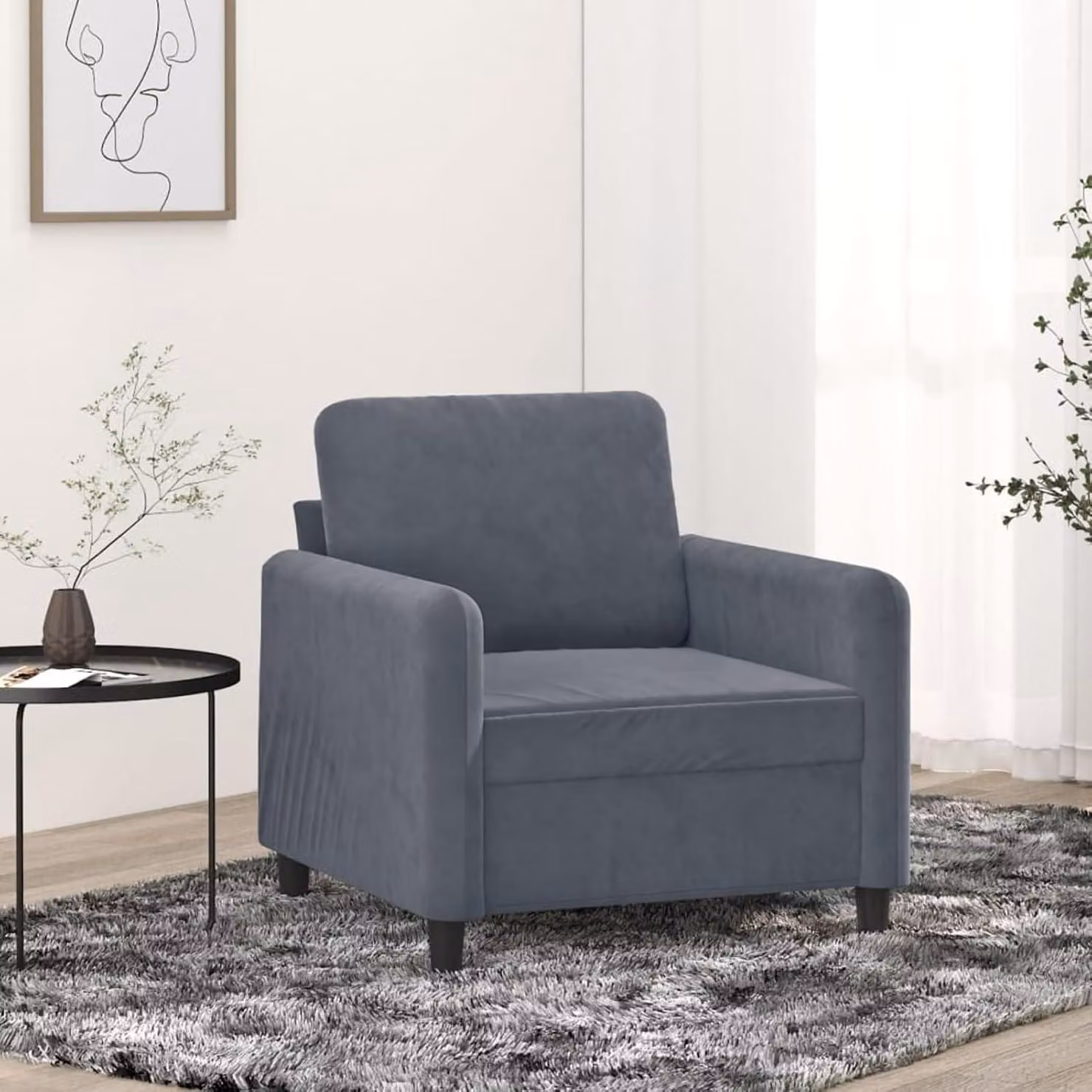 Poltrona in velluto color antracite, ideale per un soggiorno moderno, con una larghezza di 60 cm