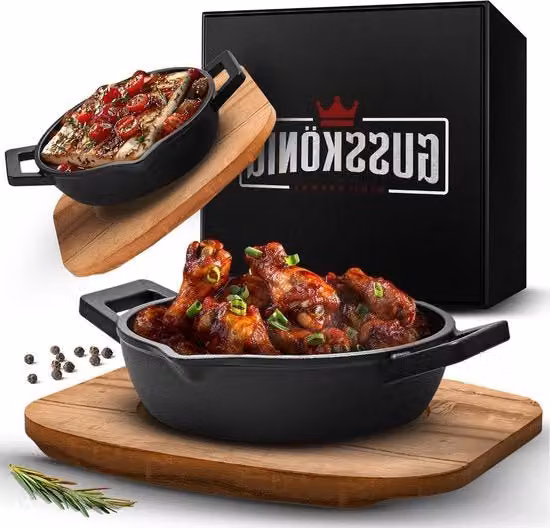 Set di 2 padelle in ghisa nere preabbruzzate con sottopanchetti in legno di acacia e libro di ricette