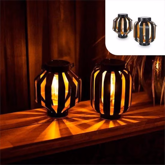 Set di 2 lanterne solari a LED per giardino in acciaio nero e oro con sensore crepuscolare e luce bianca calda