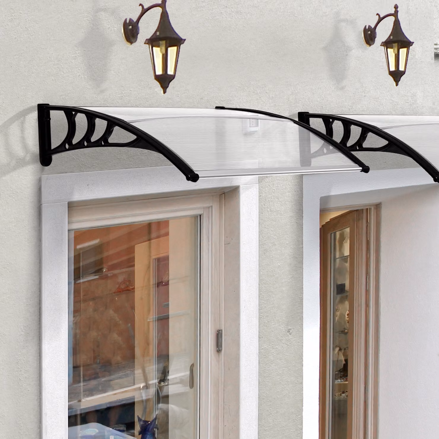 Pensilina Outsunny per porta o finestra in policarbonato impermeabile e anti-UV, disponibile in trasparente o nero, L: 120 cm – 2