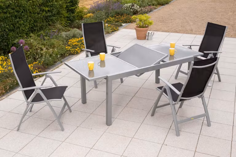 Set di mobili da giardino Merxx Carrara 5 pezzi, 4 poltrone pieghevoli nere, 1 tavolo allungabile 160/220 x 90 cm - alluminio/tessuto