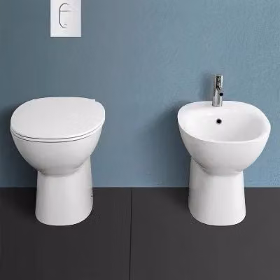 Sanitari Rimless Morning Rak Ceramics bianchi con scarico a terra e sedile soft-close L: 52 cm, P: 42 cm, H: 36,5 cm