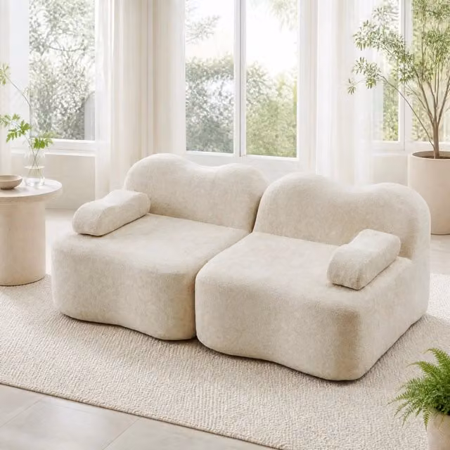 Divano modulare senza struttura interna in velluto beige con pouf collegabile