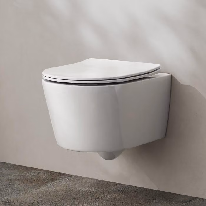 Set completo per vaso sospeso a muro Kronenbach, modello compatto, senza anello di risciacquo, con sistema di scarico a rotazione e sedile WC slim