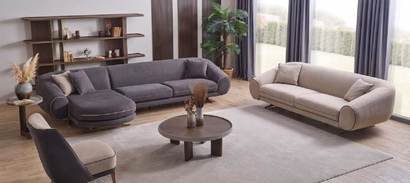 Set per soggiorno dal design moderno: divano angolare, poltrona.