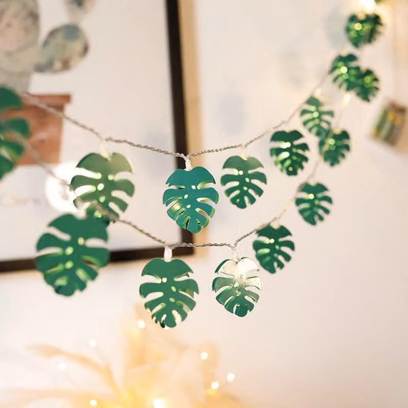Catena luminosa con foglie di Monstera, 20 LED, alimentata a batteria