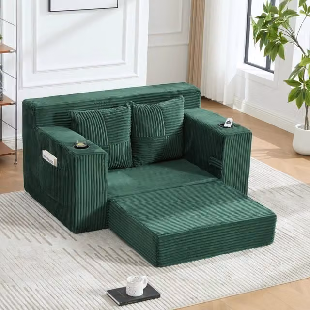 Divano letto due posti in velluto a coste verde smeraldo con cuscini e portabicchieri