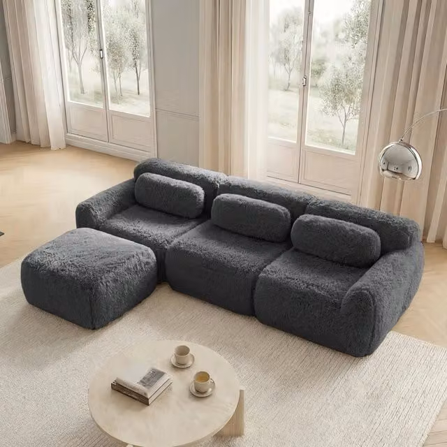 Divano angolare modulare senza telaio con seduta ampia pouf collegabile e base antiscivolo in tessuto peluche grigio