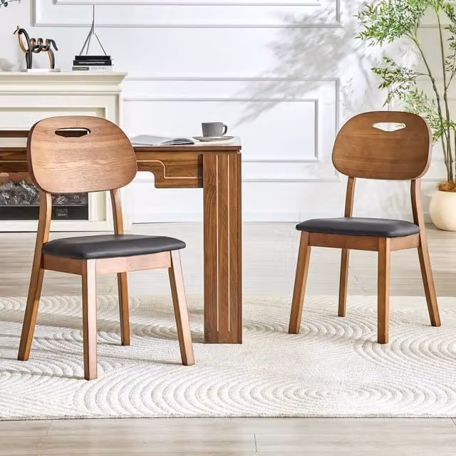 Set da 2 sedie da sala da pranzo OKWISH in stile moderno con schienale ovale e rivestimento in ecopelle nera e struttura in legno di caucciù – 1